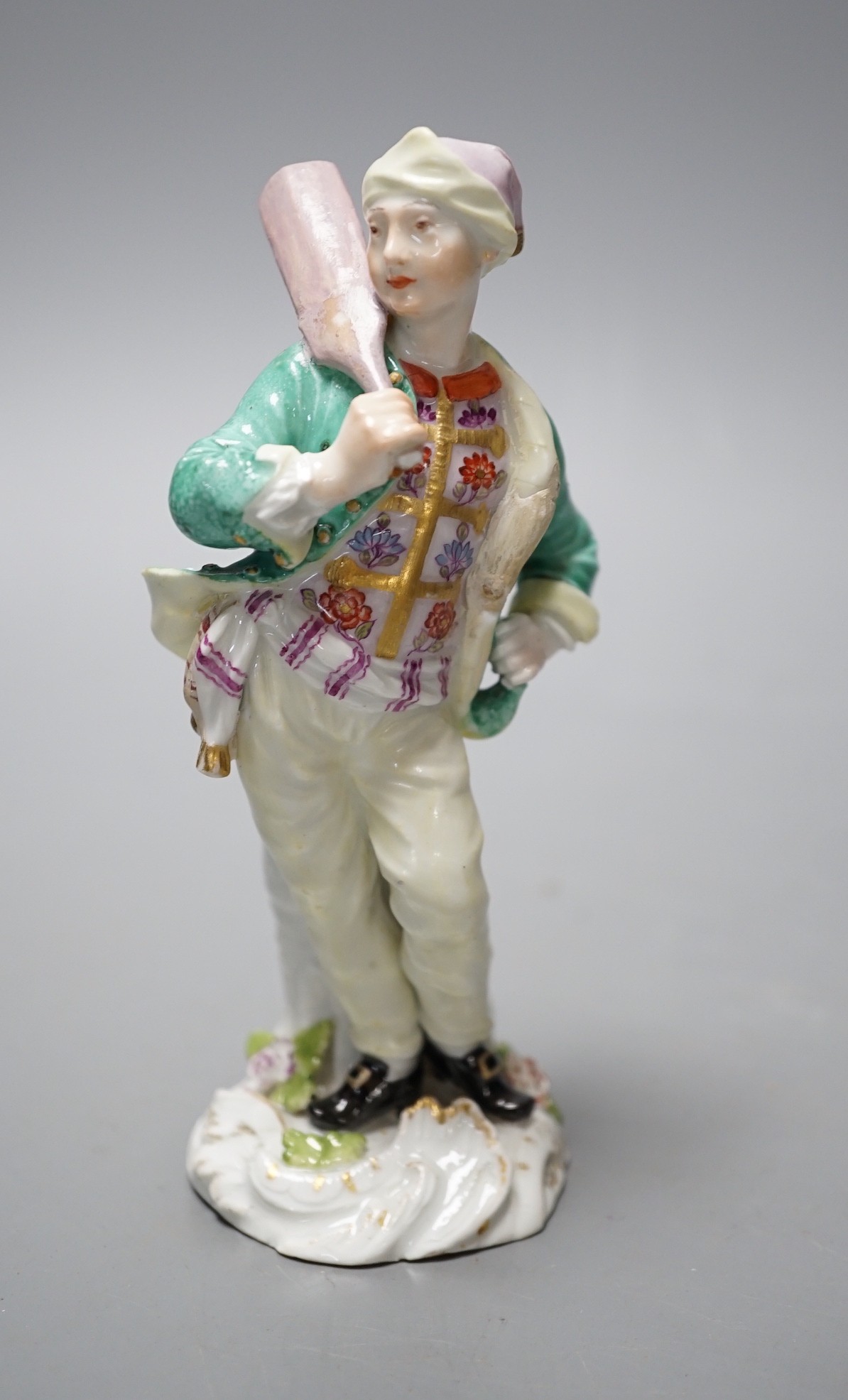 An 18th century Meissen figure of the Baker modelled by Peter Reinicke c.1755, 13.5cm tall